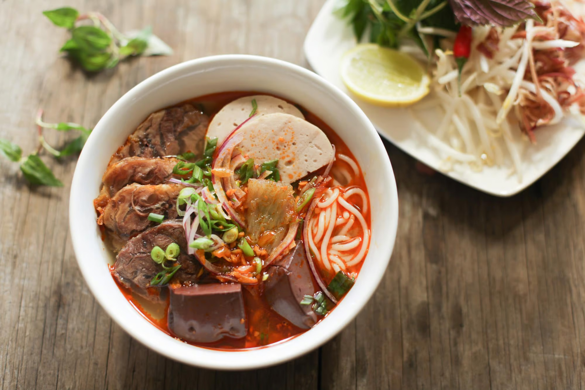 the-broth-is-simmered-for-several-hours-using-beef-bones-and-pork-hocks