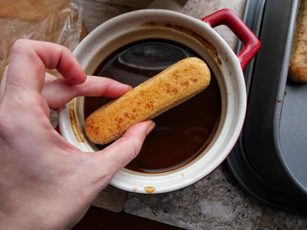 dip-ladyfingers-in-the-coffee-and-wine-mixture